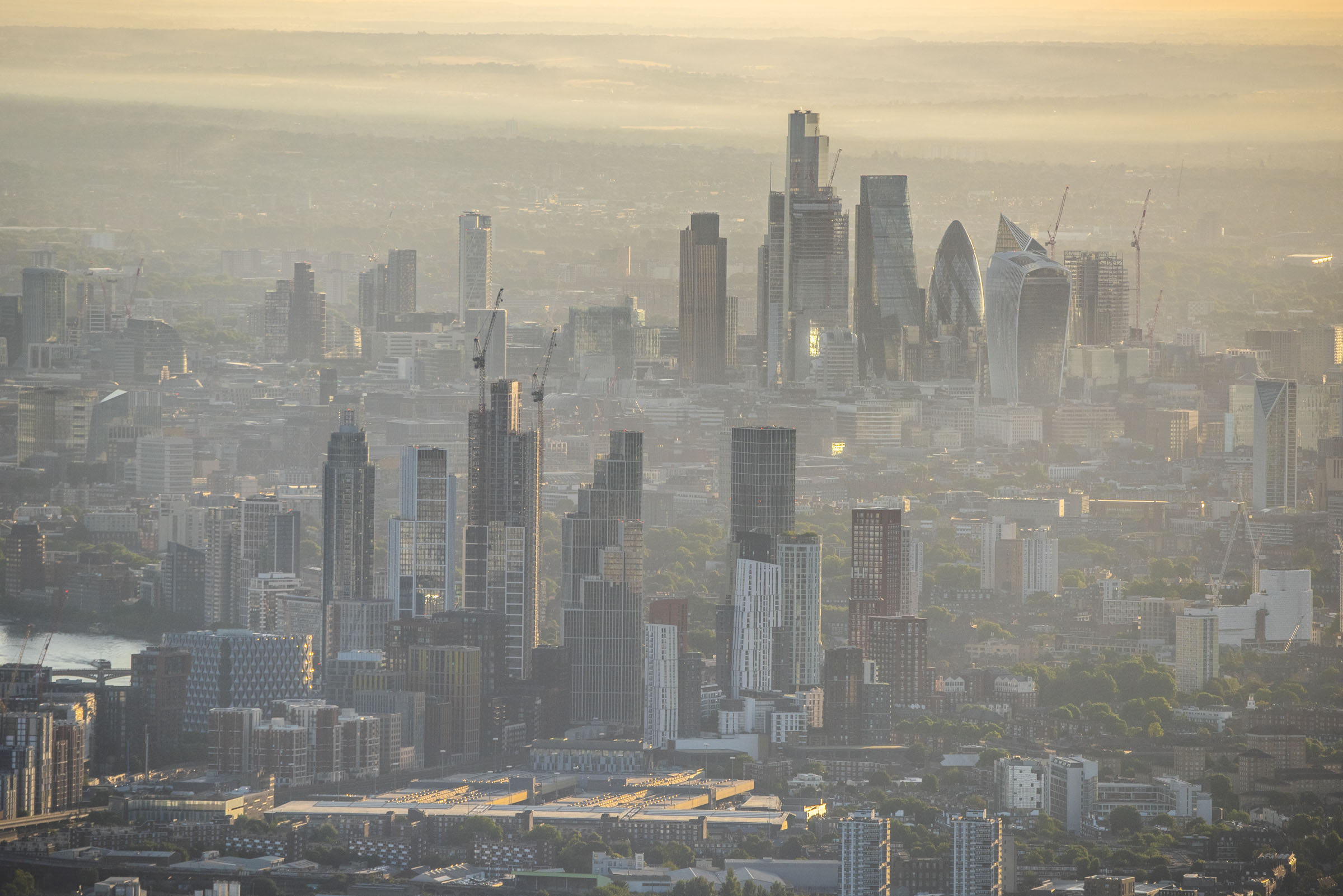 Misty morning view over Vauxhall with the City of London in background. 
